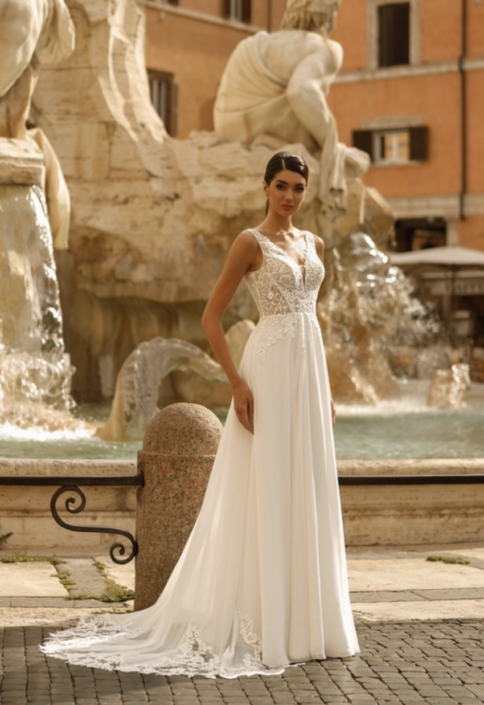 La robe Marjolaine est une robe de mariée style Bohème Chic avec son bustier dentelle serti de léger sequins et une belle fluidité sur la jupe avec sa mousseline. La jupe se termine par une belle traine en dentelle. Cette sublime robe de mariée vous attend dans votre boutique "Rêve d'un Jour" à Yvetot (entre Rouen et Le Havre)